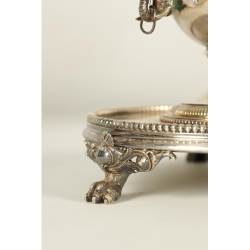 349 - A 19TH CENTURY SILVER PLATED THREE PIECE GARNITURE EPERGNE the tall centrepiece with etched glass to... 