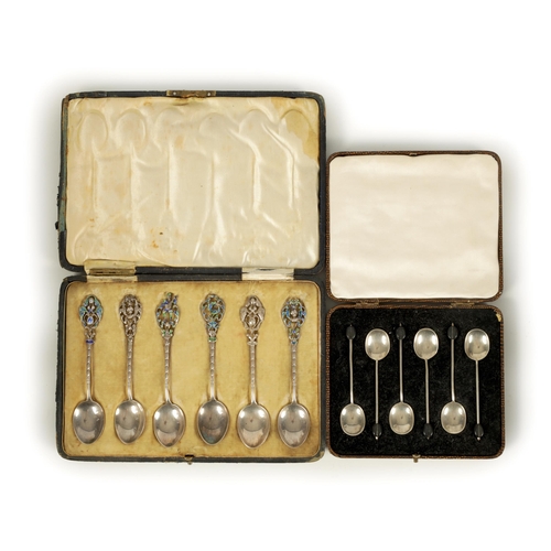 350 - A CASED SET OF EDWARD VII SILVER AND ENAMELLED TEASPOONS with flattened filigree handles depicting f... 