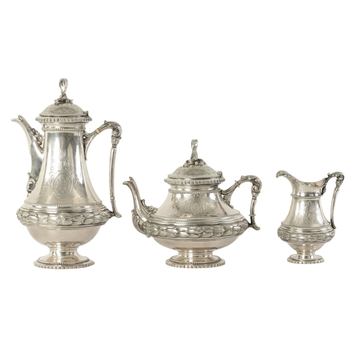 353 - A 19TH CENTURY CONTINENTAL SILVER THREE PIECE TEA SERVICE the engraved domed lids with ribbon and ta... 