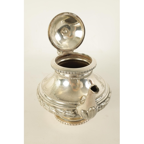 353 - A 19TH CENTURY CONTINENTAL SILVER THREE PIECE TEA SERVICE the engraved domed lids with ribbon and ta... 