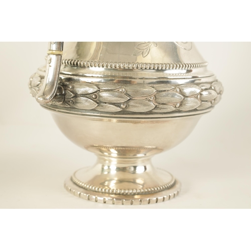 353 - A 19TH CENTURY CONTINENTAL SILVER THREE PIECE TEA SERVICE the engraved domed lids with ribbon and ta... 