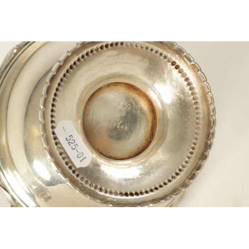 353 - A 19TH CENTURY CONTINENTAL SILVER THREE PIECE TEA SERVICE the engraved domed lids with ribbon and ta... 