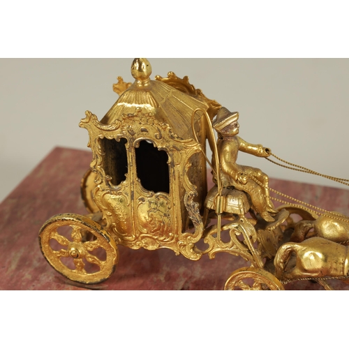 354 - A 19TH CENTURY FRENCH SILVER GILT MODEL OF A COACH AND HORSES WITH RIDER mounted on a veined pink ma... 