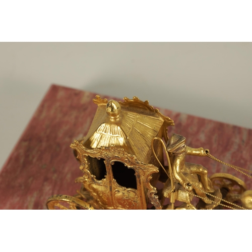 354 - A 19TH CENTURY FRENCH SILVER GILT MODEL OF A COACH AND HORSES WITH RIDER mounted on a veined pink ma... 