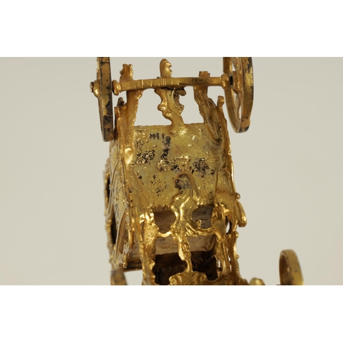 354 - A 19TH CENTURY FRENCH SILVER GILT MODEL OF A COACH AND HORSES WITH RIDER mounted on a veined pink ma... 