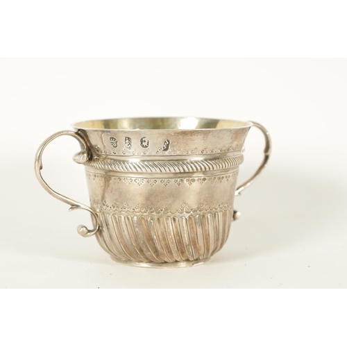 355 - A WILLIAM AND MARY BRITTANIA STANDARD SILVER PORRINGER BY JOHN CORY, LONDON with scrolled dated cart... 