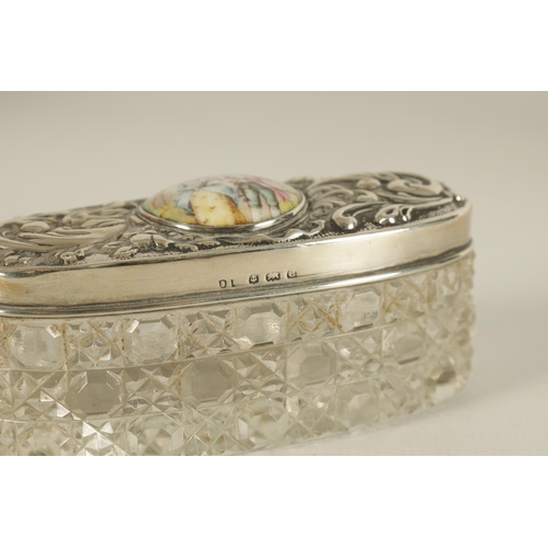 362 - AN EDWARD VII SILVER, ENAMEL AND CUT GLASS DRESSING TABLE BOX the silver lid with hand-painted figur... 