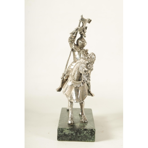 365 - AN EARLY 20TH CENTURY FILLED SILVER KNIGHT ON HORSE BACK mounted on an Antico Verde marble base. (20... 