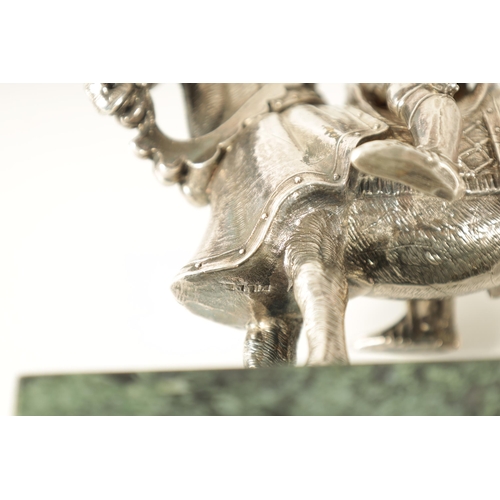 365 - AN EARLY 20TH CENTURY FILLED SILVER KNIGHT ON HORSE BACK mounted on an Antico Verde marble base. (20... 