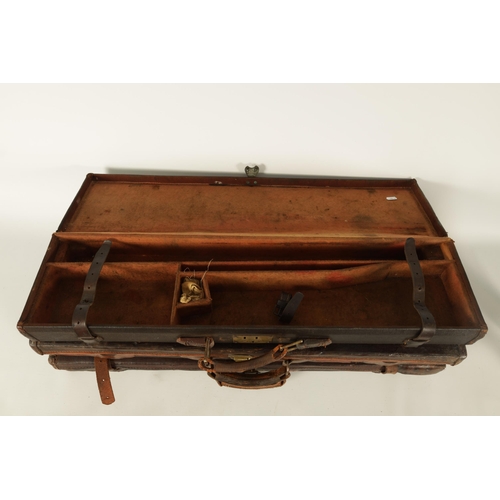 372 - A COLLECTION OF THREE LEATHER AND CANVAS LINED SHOTGUN CASES with brass locks and fitted interiors, ... 