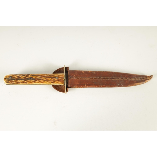 379 - A LATE 19TH CENTURY STAG HORN HANDLED BOWIE KNIFE with nickel guard and single edged steel blade wit... 