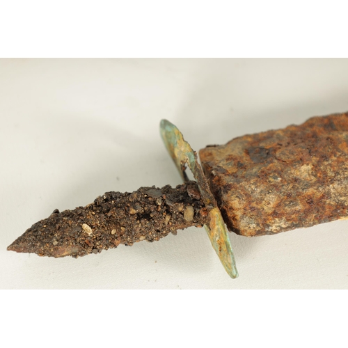 389 - AN EXCAVATED SCOTTISH DIRK AND AXE HEAD (53cm overall )