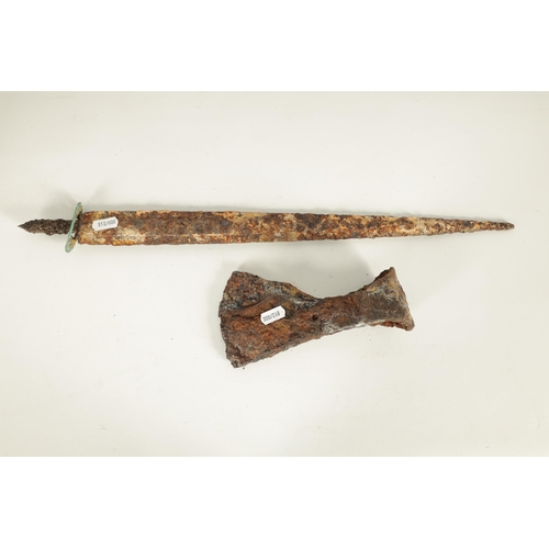 389 - AN EXCAVATED SCOTTISH DIRK AND AXE HEAD (53cm overall )