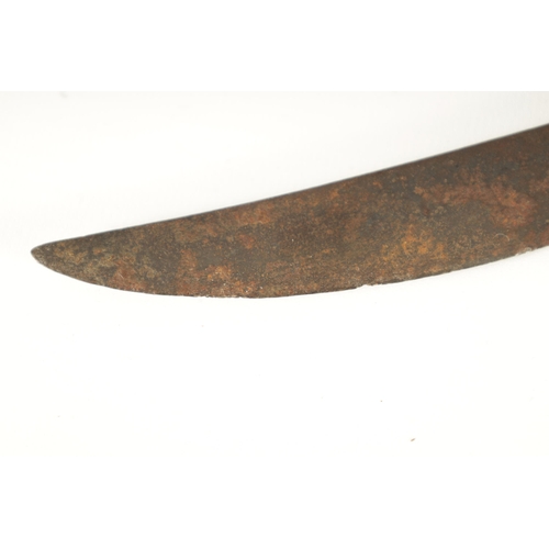 394 - AN 18TH CENTURY SRI LANKAN RHINOCEROS HORN HANDLED KASTANE SWORD the handle formed as a primitively ... 