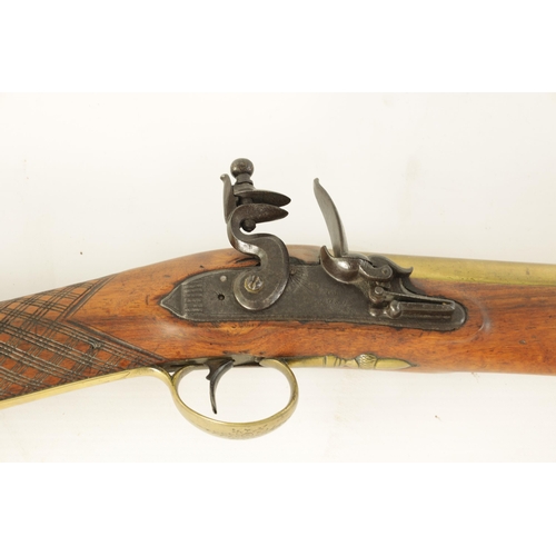 402 - I.H. WALDRON, LONDON. AN EARLY 19TH CENTURY BRASS BARRELLED FLINTLOCK BLUNDERBUSS having a splayed b... 