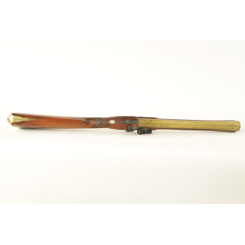 402 - I.H. WALDRON, LONDON. AN EARLY 19TH CENTURY BRASS BARRELLED FLINTLOCK BLUNDERBUSS having a splayed b... 