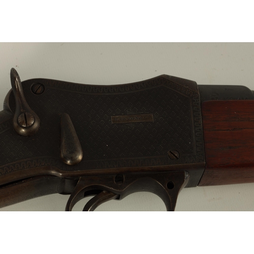 405 - A MID 19TH CENTURY MANTON & CO. 577-450 SMOOTH BORE MARTINI ACTION RIFLE with smooth bored barrel pr... 