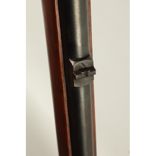 405 - A MID 19TH CENTURY MANTON & CO. 577-450 SMOOTH BORE MARTINI ACTION RIFLE with smooth bored barrel pr... 