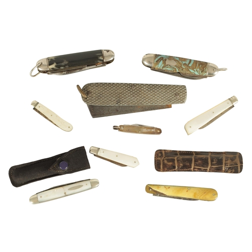 413 - A COLLECTION OF NINE MULTI BLADE PENKNIVES including four mother of pearl examples, one silver knife... 