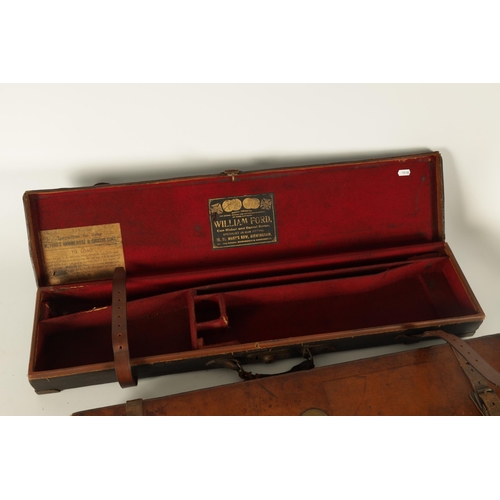 426 - A LEATHER BOUND SHOTGUN CASE BY HOLLAND & HOLLAND, LONDON with fitted interior, original label and b... 