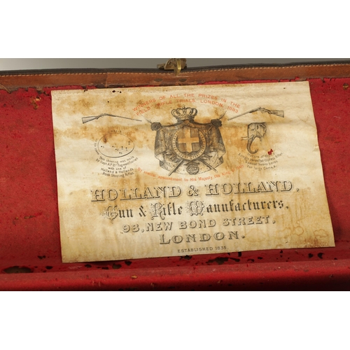 426 - A LEATHER BOUND SHOTGUN CASE BY HOLLAND & HOLLAND, LONDON with fitted interior, original label and b... 