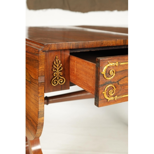 1198 - A REGENCY BRASS MOUNTED FIGURED ROSEWOOD SOFA TABLE with fold-down ends enclosing two frieze drawers... 