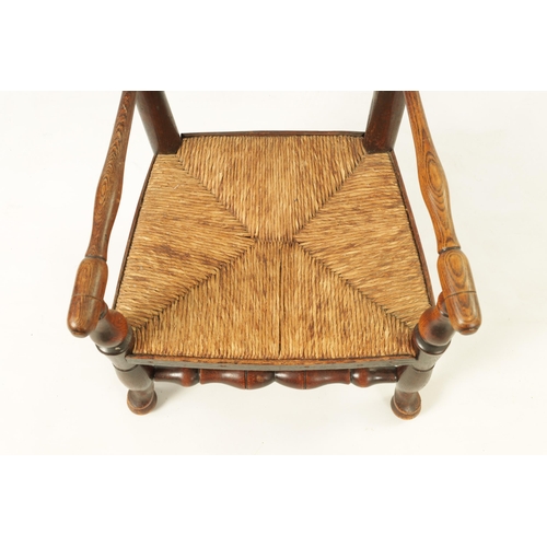 1200 - A 19TH CENTURY ASH AND ELM LADDER BACK CHILDS CHAIR with rushwork seat (44.5cm wide 83cm high )