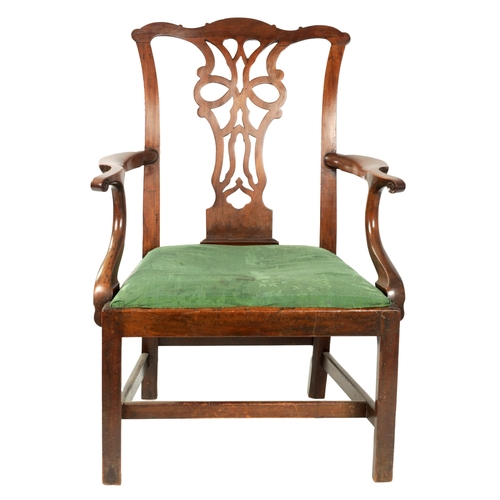 1201 - AN EARLY GEORGE III CHIPPENDALE DESIGN MAHOGANY OPEN ARM CHAIR OF GENEROUS SIZE the shaped top rail ... 