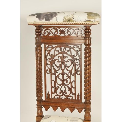 1202 - A 19TH CENTURY FIGURED ROSEWOOD PRAYER CHAIR with fret work back flanked by twisted columns and low ... 