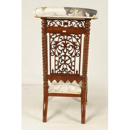 1202 - A 19TH CENTURY FIGURED ROSEWOOD PRAYER CHAIR with fret work back flanked by twisted columns and low ... 