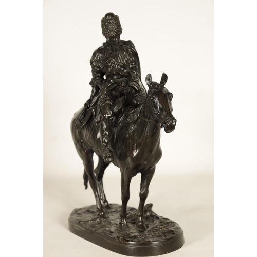 760 - E. NAHCEPE. A LATE 19TH CENTURY RUSSIAN PATINATED BRONZE SCULPTURE modelled as a Cossack on horsebac... 