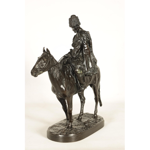 760 - E. NAHCEPE. A LATE 19TH CENTURY RUSSIAN PATINATED BRONZE SCULPTURE modelled as a Cossack on horsebac... 