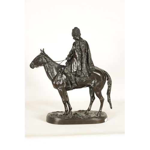 760 - E. NAHCEPE. A LATE 19TH CENTURY RUSSIAN PATINATED BRONZE SCULPTURE modelled as a Cossack on horsebac... 