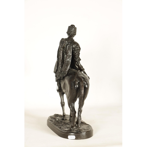 760 - E. NAHCEPE. A LATE 19TH CENTURY RUSSIAN PATINATED BRONZE SCULPTURE modelled as a Cossack on horsebac... 