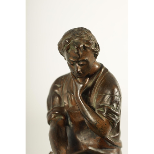 761 - AN EARLY 20TH CENTURY FIGURAL BRONZE SCULPTURE OF AN INDUSTRIALIST the seated figure by a wheel read... 