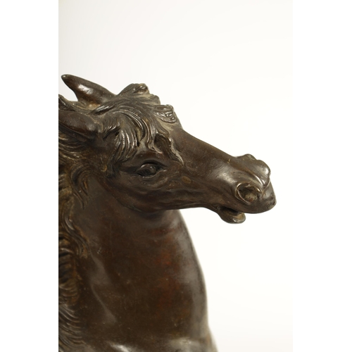 762 - A 19TH CENTURY BRONZE HORSE AND FIGURAL SCULPTURE of Odin the god of wolves - mounted on a veined gr... 