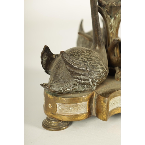 764 - A MID 19TH CENTURY PATINATED BRONZE AND ORMOLU SWAN CENTREPIECE after a design by William Bateman II... 