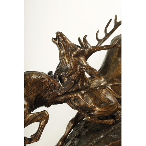 768 - THOMAS FRANCO CARTIER (1879-1943) A LARGE 19TH CENTURY FRENCH BRONZE SCULPTURE modelled as two stags... 