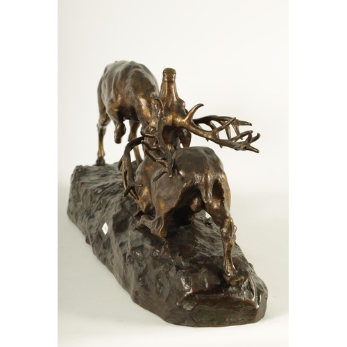 768 - THOMAS FRANCO CARTIER (1879-1943) A LARGE 19TH CENTURY FRENCH BRONZE SCULPTURE modelled as two stags... 