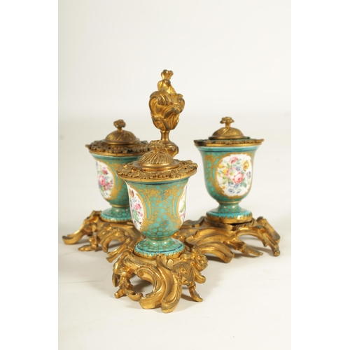 769 - A 18TH CENTURY FRENCH ROCOCO ORMOLU AND SERVES STYLE TRIPLE INKSTAND or ornate scrolled leaf cast de... 