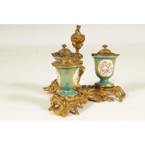 769 - A 18TH CENTURY FRENCH ROCOCO ORMOLU AND SERVES STYLE TRIPLE INKSTAND or ornate scrolled leaf cast de... 