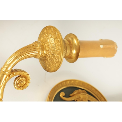 771 - A FINE PAIR OF 19TH CENTURY FRENCH EMPIRE STYLE TWO BRANCH ORMOLU AND BRONZE WALL LIGHTS modelled as... 