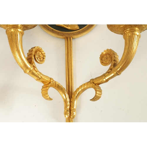 771 - A FINE PAIR OF 19TH CENTURY FRENCH EMPIRE STYLE TWO BRANCH ORMOLU AND BRONZE WALL LIGHTS modelled as... 