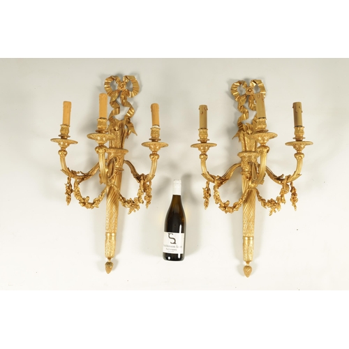 772 - A FINE LARGE PAIR OF 19TH CENTURY FRENCH EMPIRE STYLE ORMOLU THREE BRANCH WALL LIGHTS the arrow and ... 