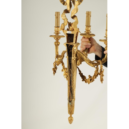 772 - A FINE LARGE PAIR OF 19TH CENTURY FRENCH EMPIRE STYLE ORMOLU THREE BRANCH WALL LIGHTS the arrow and ... 