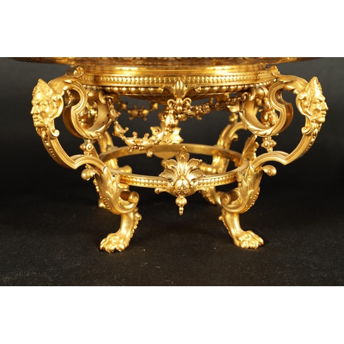 775 - FERDINAND BARBEDIENNE. AN UNUSUAL SET OF EIGHT19TH CENTURY ORMOLU TABLE COMPORTS with gilt edged gla... 