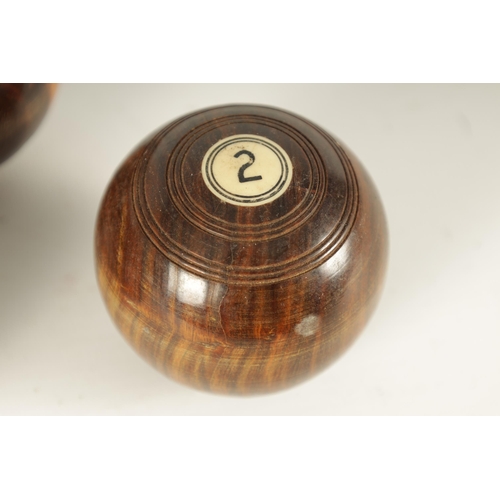 778 - FIFTEEN EARLY 20TH CENTURY JAQUES OF LONDON MINIATURE LIGNUM VITAE INDOOR CARPET BOWLS all with ivor... 