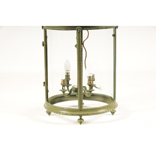 779 - A LATE 19TH/EARLY 20TH CENTURY LATER PAINTED GILT BRASS HALL LANTERN OF LARGE SIZE the circular fram... 