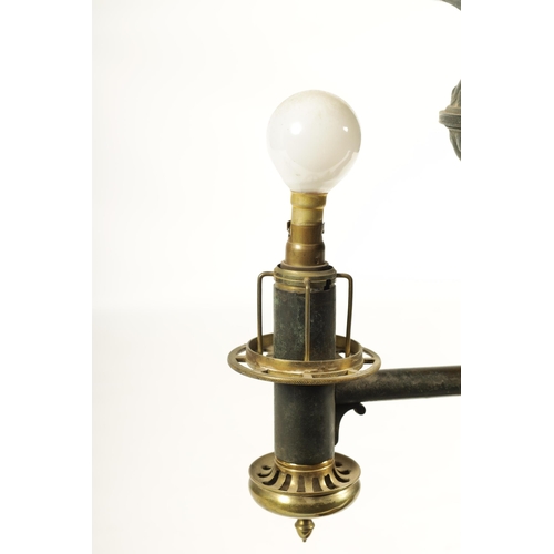 786 - A REGENCY BRONZE AND ORMOLU TABLE LAMP with acanthus leaf mouldings and masked centre raised on a sq... 