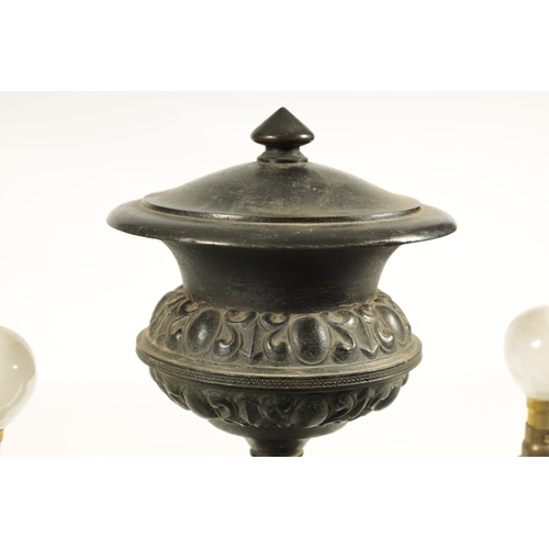 786 - A REGENCY BRONZE AND ORMOLU TABLE LAMP with acanthus leaf mouldings and masked centre raised on a sq... 